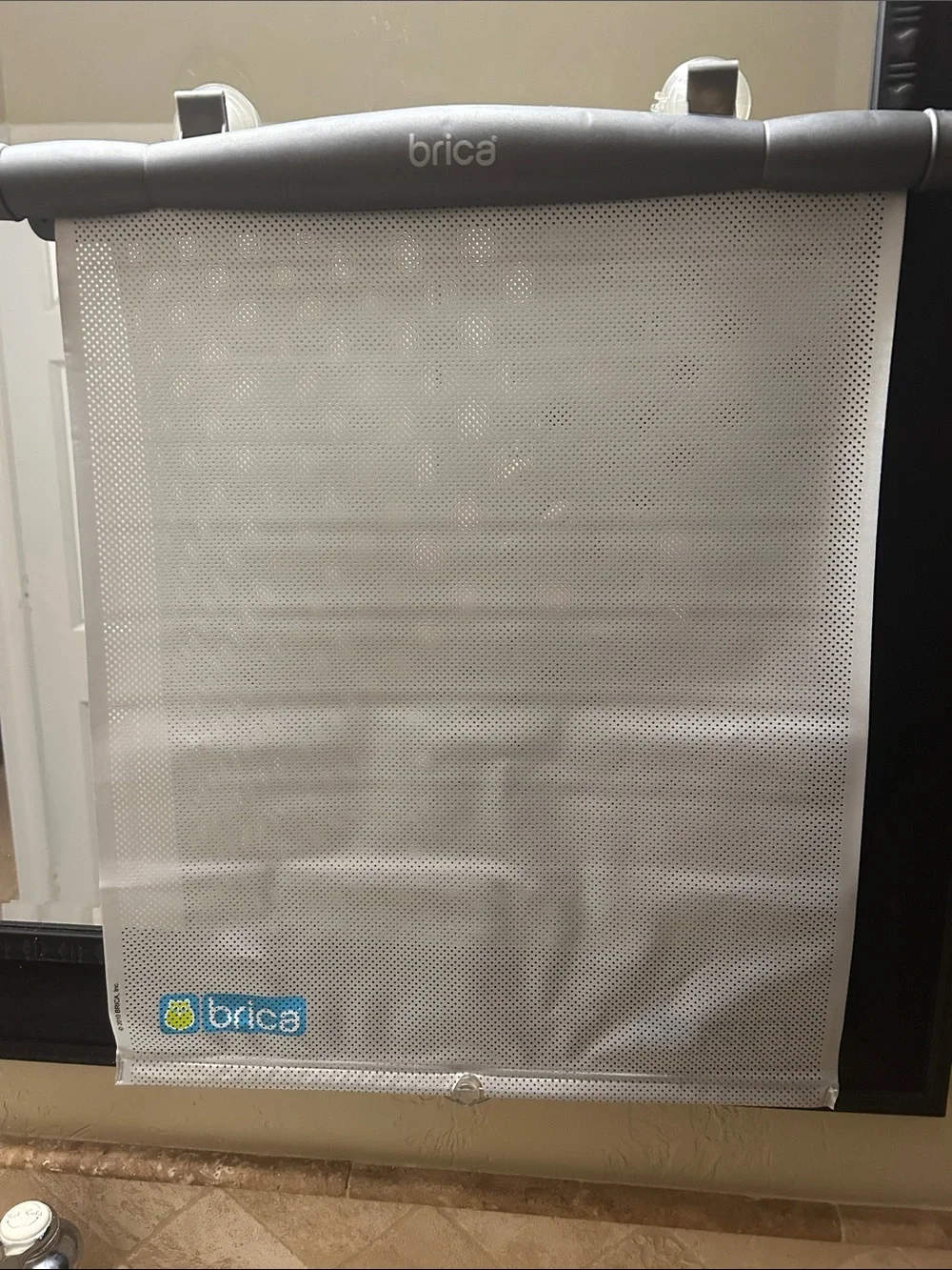 Bric's White Mesh Window Shade with Blue Logo